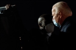 Democratic presidential candidate former Vice President Joe Biden arrives at New Castle Airport in New Castle, Del., Oct. 1, 2020, after speaking at United Food & Commercial Workers Union Local 951 in Grand Rapids, Mich.