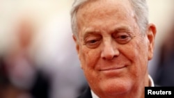 Billionaire businessman David Koch arrives at the Metropolitan Museum of Art Costume Institute Gala Benefit in New York, May 5, 2014.