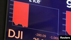 The Dow Jones Industrial Average is displayed on the trading floor at the New York Stock Exchange in New York City, Sept. 3, 2019. 