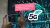 ការដាក់​បង្ហាញ​ការសាកល្បង​ការប្រើប្រាស់​បច្ចេកវិទ្យា​ទូរគមនាគមន៍​ជំនាន់​ទី៥ (5G) នៅ​ឯទីតាំង​មួយ​កន្លែង​ក្នុង​ទីក្រុង​ភ្នំពេញ នៅ​ថ្ងៃទី៨ ខែកក្កដា ឆ្នាំ២០១៩។ (អូន ឆេងប៉រ/VOA) 