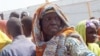FILE - An old woman, who fled her home due to violence from the Islamic extremists group Boko Haram, is seen inside a refugee camp in Minawao, Cameroon, Feb. 25, 2015. 