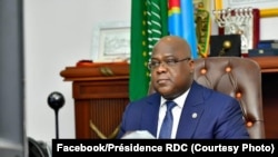 PrésidentFélix Tshisekedi na likita lya mbulamatari, na téléconférence, na cité ya Union africaine, Kinshasa, 26 juin 2020. (Facebook/Présidence RDC)