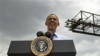 President Barack Obama speaks at the Port of Tampa about trade with Latin America before heading to Colombia for the Summit of the Americas, in Tampa, Florida, April 13, 2012.
