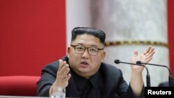 North Korean leader Kim Jong Un attends the 5th Plenary Meeting of the 7th Central Committee of the Workers' Party of Korea (WPK) in this undated photo released Dec. 31, 2019, by North Korean Central News Agency (KCNA).
