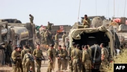 以色列军队被部署在以色列与加沙边境附近的阵地。（2023年10月11日）