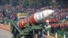 FILE - A model of a anti-satellite weapon from Defense Research and Developing Organization rolls out during Republic Day parade in New Delhi, India, Jan. 26, 2020.
