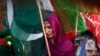Pakistani supporter of former cricket star-turned-politician, Imran Khan, takes part in rally, Islamabad, May 9, 2013.