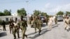 FILE - Somali soldiers patrol the streets in Mogadishu.