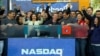 Facebook Founder and CEO Mark Zuckerberg, shown in this image from Reuters video, rings the NASDAQ Stock Market Opening Bell remotely from "Facebook" headquarters in Menlo Park, California, May18, 2012.