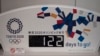 A countdown display for the Tokyo 2020 Olympics is photographed in Tokyo, Tuesday, March 24, 2020. IOC President Thomas Bach has agreed "100%" to a proposal of postponing the Tokyo Olympics for about one year until 2021 because of the coronavirus…