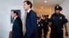 White House senior adviser Jared Kushner, center, and his attorney Abbe Lowell, left, arrive on Capitol Hill in Washington, July 25, 2017, to be questioned by the House Intelligence Committee. 