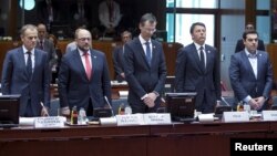 European Council President Donald Tusk (L-R), European Parliament President Martin Schulz, EU Council General-Secretary Corsepius, Italian PM Renzi and Greek PM Tsipras observe a minute of silence during a EU extraordinary summit in Brussels, April 23, 2015