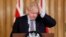 Britain's Prime Minister Boris Johnson reacts during a press conference at Downing Street on the government's coronavirus action plan in London, March 3, 2020.