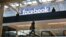 FILE - Facebook logo is displayed in a start-up companies gathering at Paris' Station F, in Paris, Jan. 17, 2017.