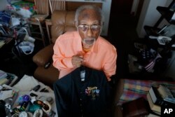 World War II veteran Johnnie Jones, Sr. poses for a portrait at his home in Baton Rouge, La., May 28, 2019.