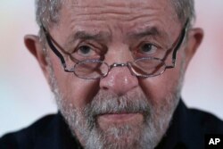 Brazil's former President Luiz Inacio Lula da Silva looks during an event with rural workers in Brasilia, March 13, 2017.