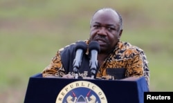 Gabon's President Ali Bongo addresses reporters at Nairobi National Park near Nairobi, Kenya, April 30, 2016.