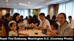 Thai Community’s volunteers in the DC gather to join hands in the making of cremation flower to honor HM the late King Bhumibol.
