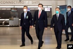 资料照：中共官媒新华社发布照片显示中国驻美新大使秦刚抵达华盛顿履新。(2021年7月28日)