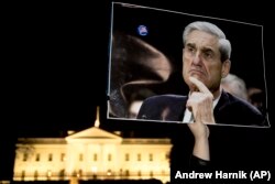 U.S. -- Protesters gather in front of the White House in Washington, November 8, 2018