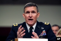 FILE - Retired Lieutenant General Michael Flynn, seen in this 2014 file photo, will join Drone Aviation Holding Corp as vice chairman of its board of directors. Flynn has been advising Republican front-runner Donald Trump informally on foreign policy.