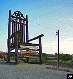 This is said to be the world's largest rocking chair, in Natty Flat, Texas. If it isn't it's gotta be close. Texas probably has a world-record cowboy to sit in it, too