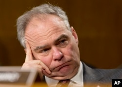 Senate Foreign Relations Committee member Sen. Tim Kaine, D-Va. listens on Capitol Hill in Washington, Jan. 11, 2017, during the committee's confirmation hearing for Secretary of State-designate Rex Tillerson.