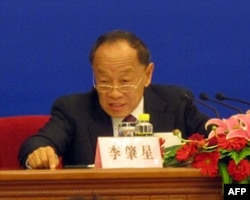 李肇星在新闻发布会上