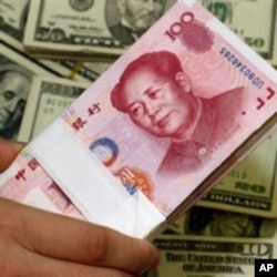 商界领袖：人民币国际化还需时日