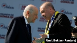 Serokomarê Tirkiyê R. Tayyip Erdogan û Serokê MHPê Devlet Bahceli.