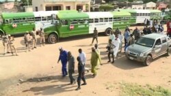 Buses transporting ex-militants enter Banki, Nigeria from Cameroon, Sept. 18, 2021.