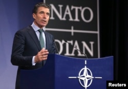 2014年4月1日北约秘书长拉斯穆森在布鲁塞尔北约外长会议新闻发布会