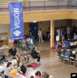 Hundreds show up for a chance to see a doctor or dentist at Remote Area Medical's (RAM) free clinics.