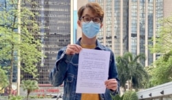 陈皓桓对警方质疑民阵违反《社团条例》感到诧异，表明不会逐一回应警方的提问。 (美国之音/汤惠芸)