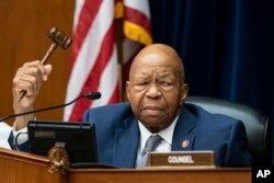 House Oversight and Reform Committee Chairman Elijah E. Cummings, D-Md., considers whether to hold Attorney General William Barr and Commerce Secretary Wilbur Ross in contempt, on Capitol Hill in Washington, June 12, 2019.