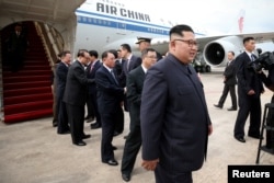 金正恩2018年6月10日乘坐中国国际国际航空公司的波音-747喷气式客机抵达新加坡。
