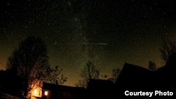 The view of the night sky from the Waldoboro Maine farmhouse where “The City Dark” filmmaker Ian Cheney grew up gazing at the stars (Courtesy Wicked Delicate Films)