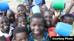 Students in Kanje school celebrate after eat porridge (Mary's Meals)