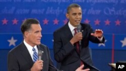 President Barack Obama, right, and Republican presidential candidate Mitt Romney participate in the presidential debate, October 16, 2012, at Hofstra University in Hempstead, New York.