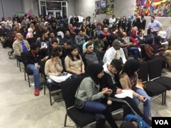 A crowd gathers at an election watch party sponsored by ACCESS and the Michigan Muslim Community Council, at the Arab American National Museum Annex, in Dearborn, Michigan, Nov. 8, 2016. (K. Farabaugh/VOA)