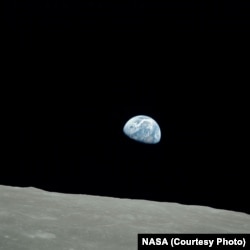 Earthrise, a photo taken by astronaut William Anders during the Apollo 8 moon mission, shows our planet in the vastness of space.