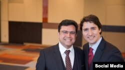 مجید جوهری در کنار جاستین ترودو رهبر حزب لیبرال