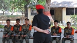 FILE - Indian army women recruits attend a class as part of their training, during a media visit in Bengaluru, India, March 31, 2021.