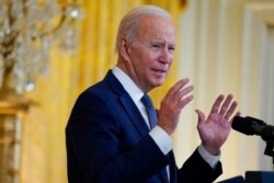 President Joe Biden speaks to commemorate World AIDS Day during an event in the East Room of the White House, Dec. 1, 2021.