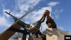 Afghanistan -- An Afghan security official secure area during an operation against Taliban militants in Laghman province, March 2, 2017