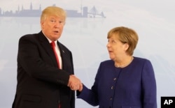 美国总统川普和德国总理默克尔在汉堡会面