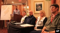 Shell Oil incident commander Susan Childs, second from right, answers a question about the grounding of the drill ship Kulluk at a press conference, Monday, Dec. 31, 2012 in Anchorage.