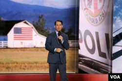 Wisconsin Governor Scott Walker speaks to the Republican National Convention, in Cleveland, July 20, 2016.