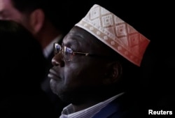 President Barack Obama's half brother Malik, a guest of Republican U.S. presidential candidate Donald Trump, sits in the crowd watching the third and final 2016 presidential campaign debate at UNLV in Las Vegas, Oct. 19, 2016.