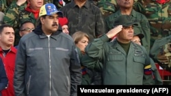 VENEZUELA -- Venezuelan President Nicolas Maduro (L) and Defence Minister Vladimir Padrino attending a military ceremony to commemorate the "27th Anniversary of the Military Rebellion of the 4FEB92 and National Dignity Day", in Caracas, February 4, 2019